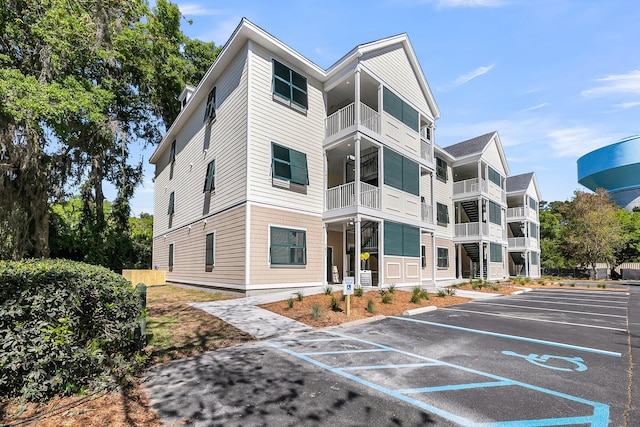 7416 Indigo Palms Way, Johns Island, SC 29455 - view of building exterior with uncovered parking