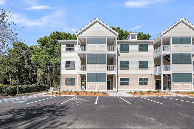 7416 Indigo Palms Way, Johns Island, SC 29455 - view of building exterior with uncovered parking