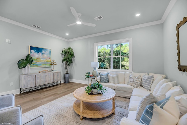 7416 Indigo Palms Way, Johns Island, SC 29455 - living area featuring wood finished floors, ornamental molding, a ceiling fan, recessed lighting, and baseboards