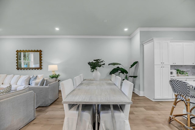 7416 Indigo Palms Way, Johns Island, SC 29455 - dining space with ornamental molding, light wood finished floors, recessed lighting, and baseboards