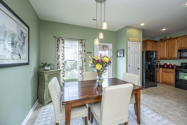 dining room featuring light tile patterned floors