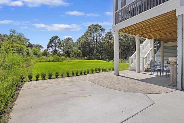 view of patio / terrace featuring stairs