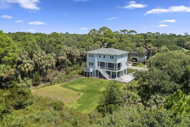 bird's eye view with a forest view