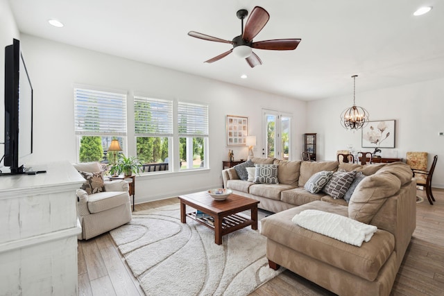 516 Tidewater Chase Ln, Summerville, SC 29486 - living area featuring light wood-style floors, a chandelier, recessed lighting, a ceiling fan, and baseboards