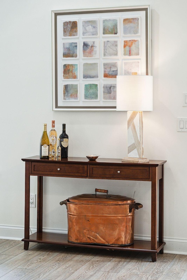 516 Tidewater Chase Ln, Summerville, SC 29486 - detailed view of wood finished floors, a bar, and baseboards