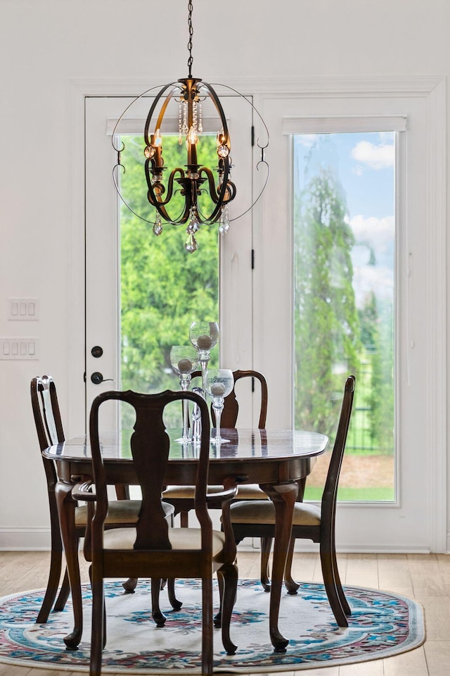 516 Tidewater Chase Ln, Summerville, SC 29486 - dining area with a chandelier and baseboards