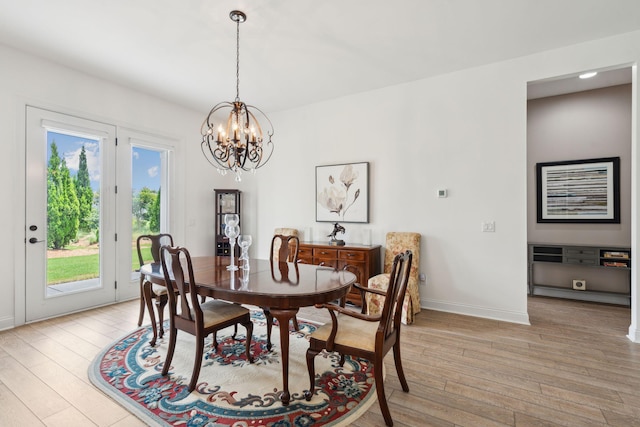 516 Tidewater Chase Ln, Summerville, SC 29486 - dining room featuring light wood-style floors, a chandelier, and baseboards