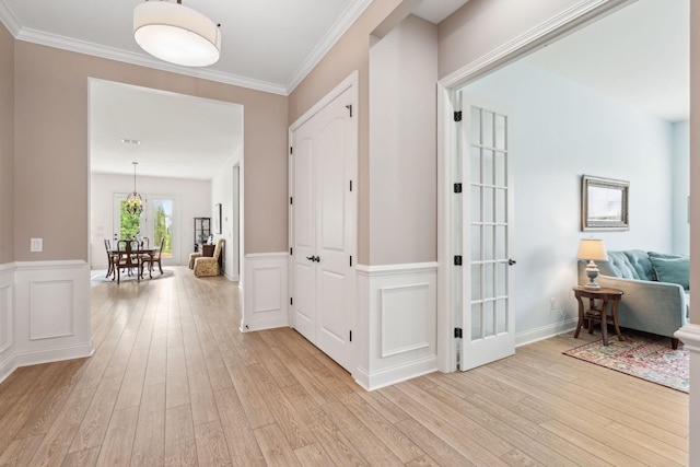 516 Tidewater Chase Ln, Summerville, SC 29486 - hall featuring light wood-style flooring, ornamental molding, and a wainscoted wall