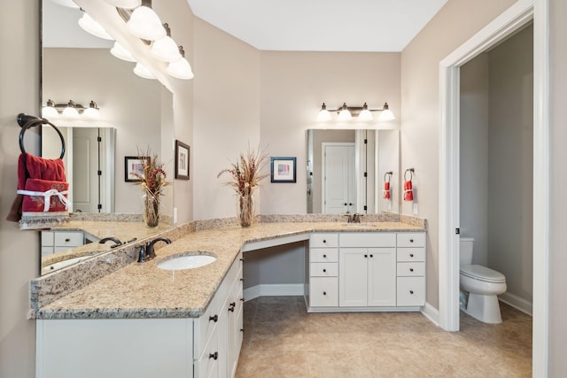 516 Tidewater Chase Ln, Summerville, SC 29486 - full bathroom with double vanity, toilet, baseboards, and tile patterned flooring