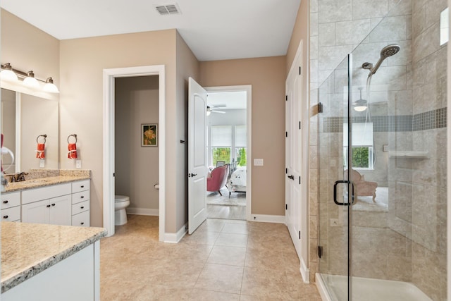 516 Tidewater Chase Ln, Summerville, SC 29486 - full bath featuring vanity, ceiling fan, a shower stall, toilet, and baseboards