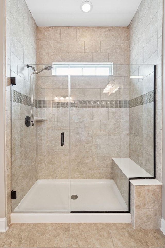 516 Tidewater Chase Ln, Summerville, SC 29486 - full bathroom featuring healthy amount of natural light, a stall shower, tile patterned floors, and baseboards