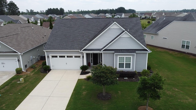 516 Tidewater Chase Ln, Summerville, SC 29486 - traditional-style home with a shingled roof, driveway, a residential view, and a garage