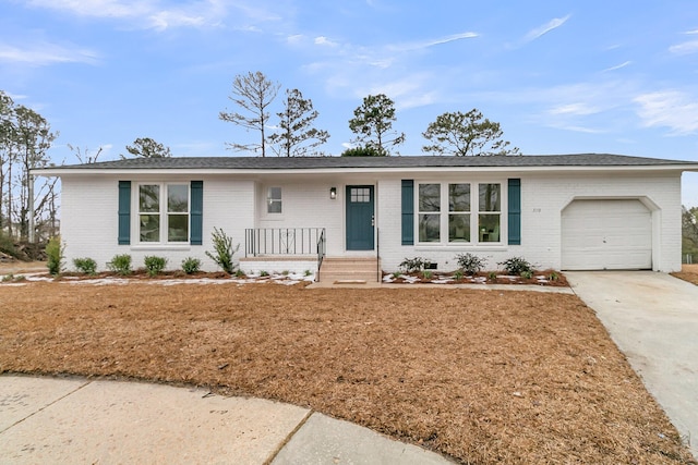 ranch-style house featuring a garage and a porch