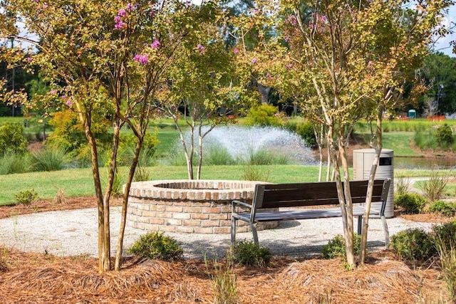 view of community featuring a yard