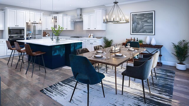 dining area featuring a notable chandelier, dark wood-type flooring, and recessed lighting