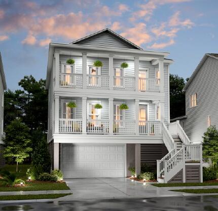 view of front of house with concrete driveway, an attached garage, stairs, and a balcony
