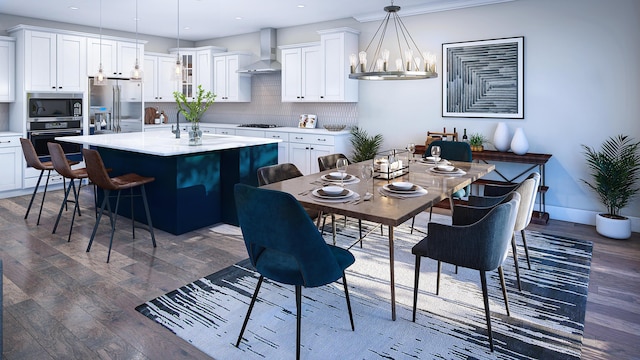 dining area featuring a notable chandelier, dark wood-type flooring, and recessed lighting