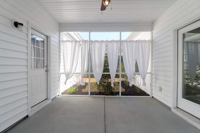 unfurnished sunroom featuring plenty of natural light