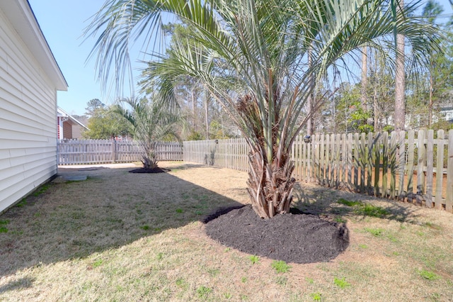 view of yard with a fenced backyard