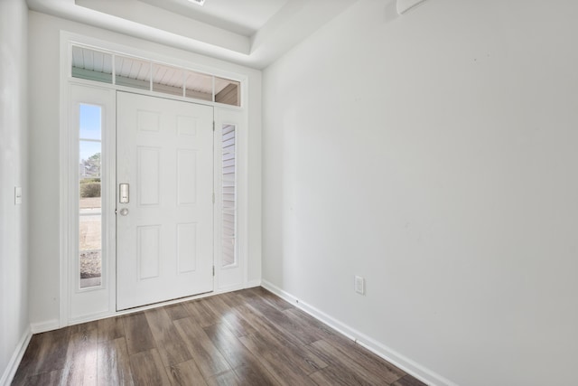 entrance foyer with wood finished floors and baseboards