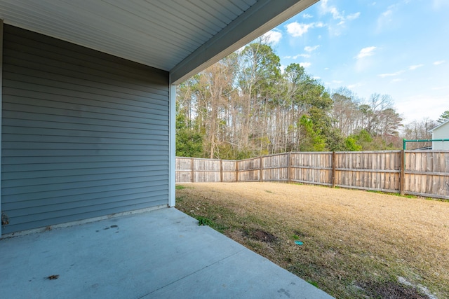 view of yard featuring a fenced backyard and a patio