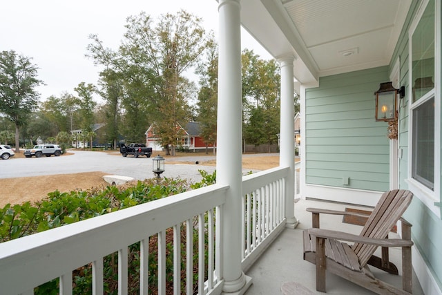 balcony featuring covered porch