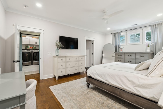 bedroom featuring separate washer and dryer, ceiling fan, dark hardwood / wood-style floors, and ornamental molding