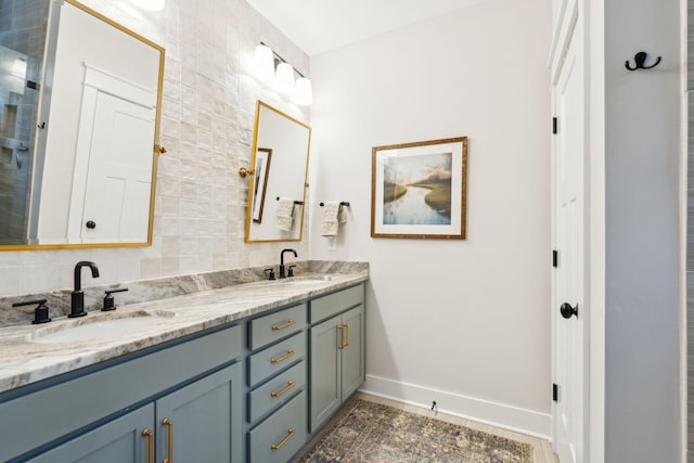 bathroom featuring decorative backsplash and vanity