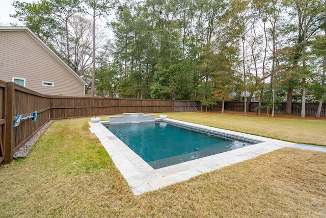 view of pool featuring a yard