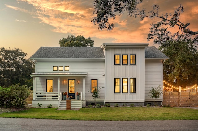 2 Live Oak Ave, Charleston, SC 29407 - modern farmhouse style home with a porch, board and batten siding, crawl space, and a yard