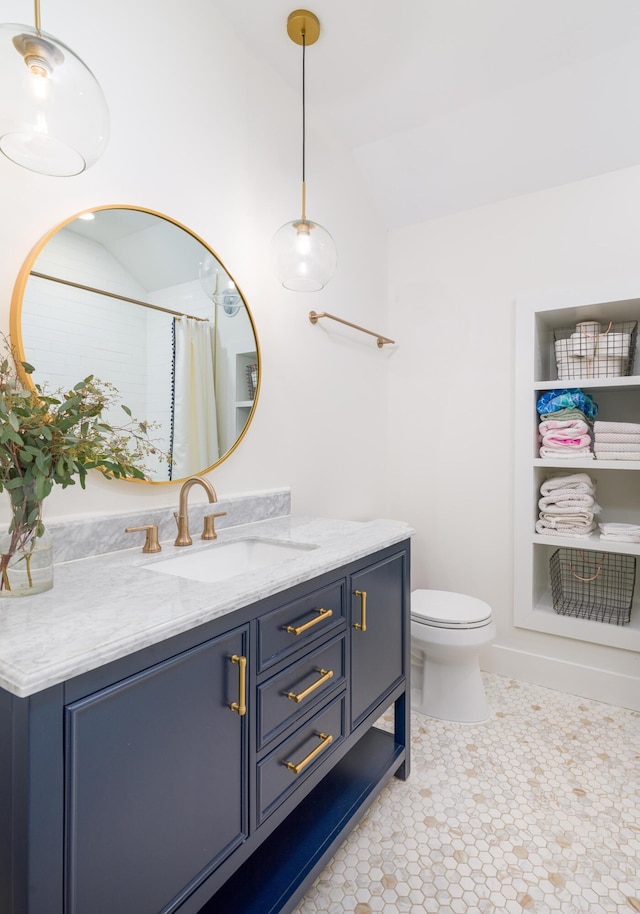 2 Live Oak Ave, Charleston, SC 29407 - full bathroom with a shower with curtain, toilet, vanity, tile patterned flooring, and lofted ceiling