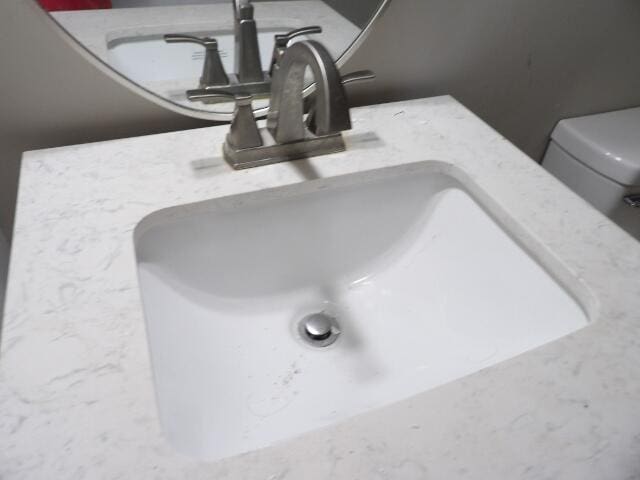 bathroom view of a sink and toilet