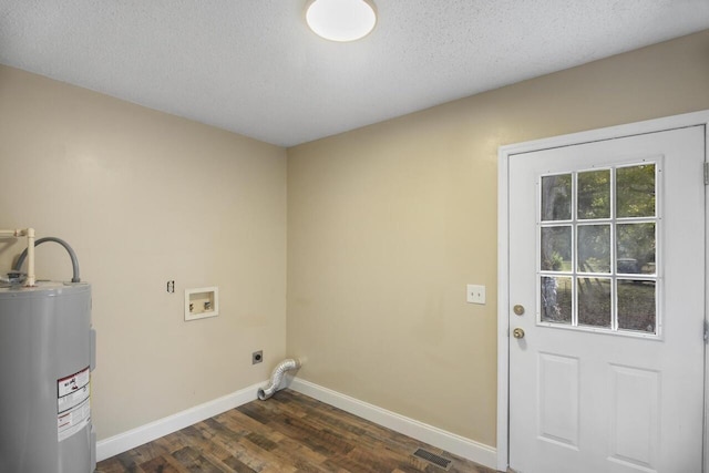 laundry room featuring a textured ceiling, hookup for an electric dryer, electric water heater, and dark hardwood / wood-style floors