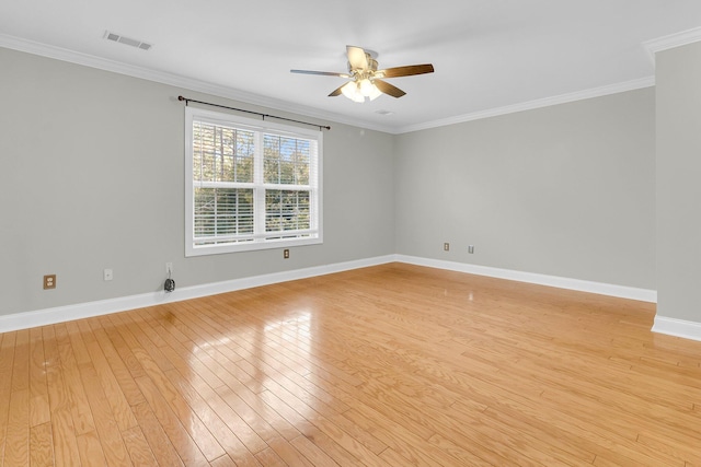 spare room with ceiling fan, light hardwood / wood-style flooring, and ornamental molding