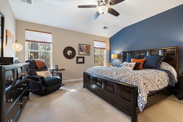 bedroom featuring visible vents, baseboards, lofted ceiling, ceiling fan, and carpet