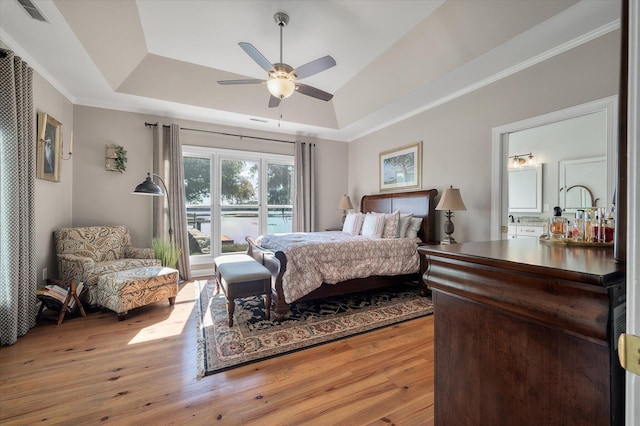 3948 Gift Blvd, Johns Island, SC 29455 - bedroom with a raised ceiling, wood finished floors, crown molding, and ceiling fan