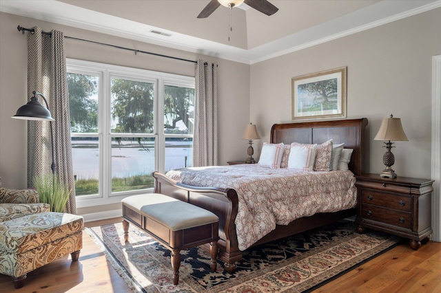 3948 Gift Blvd, Johns Island, SC 29455 - bedroom with wood finished floors, multiple windows, ornamental molding, and ceiling fan