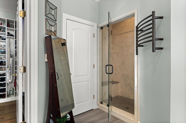 3948 Gift Blvd, Johns Island, SC 29455 - full bathroom featuring wood finished floors, a shower stall, and a walk in closet