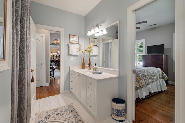3948 Gift Blvd, Johns Island, SC 29455 - full bath with ensuite bathroom, tile patterned flooring, vanity, a ceiling fan, and baseboards