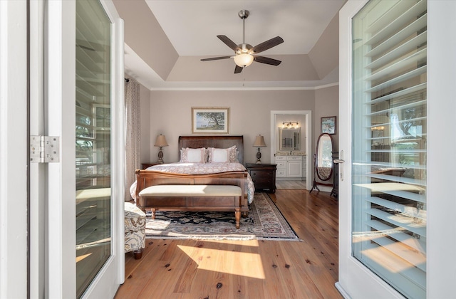 3948 Gift Blvd, Johns Island, SC 29455 - bedroom with a raised ceiling, wood finished floors, a ceiling fan, and ornamental molding