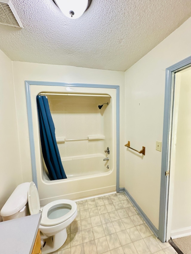 full bathroom with a textured ceiling, vanity, toilet, and shower / bathtub combination with curtain