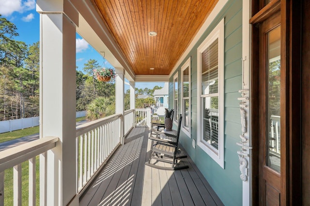 wooden deck featuring a porch