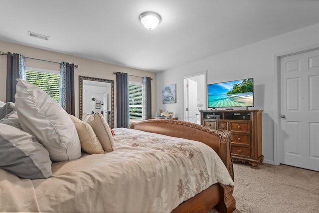 bedroom featuring carpet