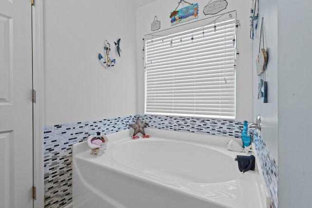 full bathroom with a garden tub