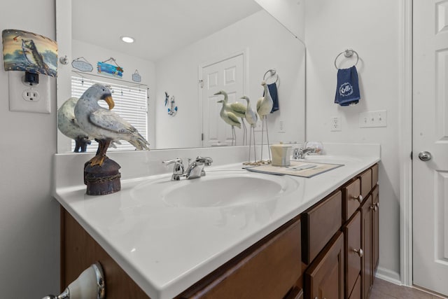 bathroom featuring double vanity