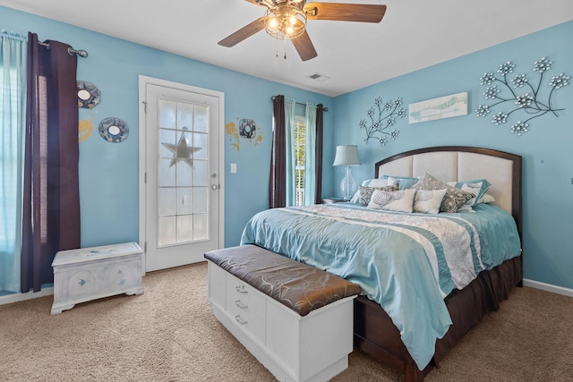 bedroom featuring carpet flooring, baseboards, and a ceiling fan