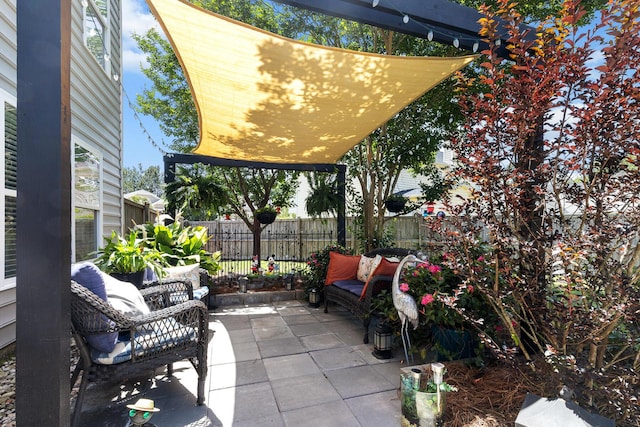view of patio with a fenced backyard and an outdoor hangout area