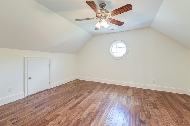 bonus room featuring ceiling fan, hardwood / wood-style flooring, and vaulted ceiling