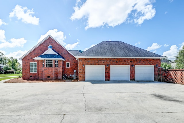 view of front of home with a garage