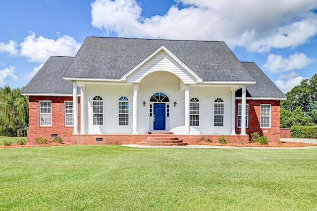 view of front of house with a porch and a front yard